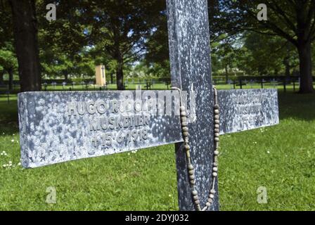 German WW1 soldier graves marked by iron crosses at Bray sur Somme Deutscher Soldatenfriedhof (German soldier cemetery) Bray sur Somme, France. Stock Photo