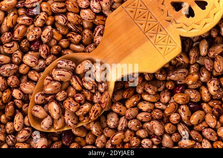 White Cargamanto beans, also known as Cranberry, Borlotti or Romano beans  background and texture. Top view. Stock Photo