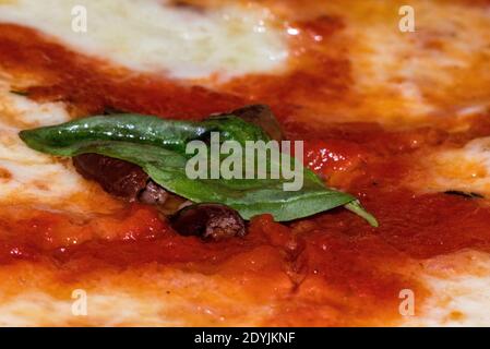 pizza with tomato and mozzarella in close-up view Stock Photo