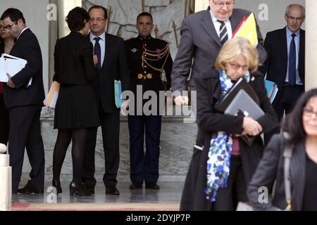 French President Francois Hollande talks with Minister for Women's Rights and Government Spokesperson Najat Vallaud-Belkacem as they leave the Elysee Palace after the weekly cabinet meeting, in Paris, France on May 2, 2013. Photo by Stephane Lemouton/ABACAPRESS.COM Stock Photo