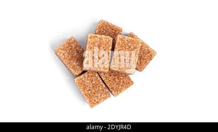 Demerara cane sugar in cubes on a white background. High quality photo Stock Photo