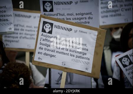 Around 150 French nurses and nurse aids joined by students took the street for a demonstration called by Facebook collective 'Ni Bonnes, ni Nonnes, ni Pigeonnes ('Neither Maid, Nor Nuns, Nor Pigeons') to ask for reconsideration of their working conditions and raise awarness of the patients' risks due to lack of staff and means, in Paris, France on May 12, 2013. Photo by Nicolas Messyasz/ABACAPRESS.COM Stock Photo