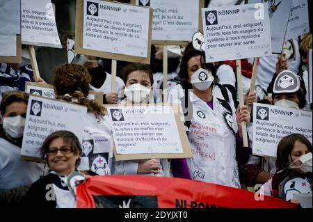 Around 150 French nurses and nurse aids joined by students took the street for a demonstration called by Facebook collective 'Ni Bonnes, ni Nonnes, ni Pigeonnes ('Neither Maid, Nor Nuns, Nor Pigeons') to ask for reconsideration of their working conditions and raise awarness of the patients' risks due to lack of staff and means, in Paris, France on May 12, 2013. Photo by Nicolas Messyasz/ABACAPRESS.COM Stock Photo