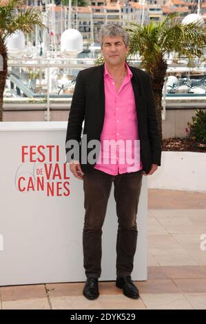 Alain Guiraudie posing at the 'L'inconnu du Lac'' photocall held at the Palais Des Festivals as part of the 66th Cannes film festival, in Cannes, southern France, on May 17, 2013. Photo by Aurore Marechal/ABACAPRESS.COM Stock Photo