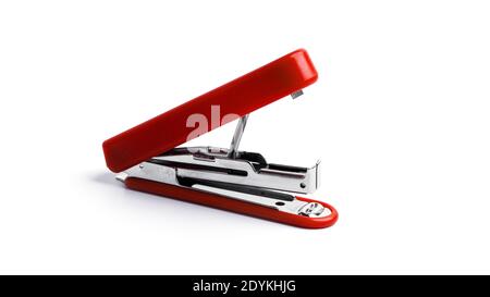Red stapler on a white background. High quality photo Stock Photo