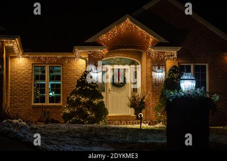 Christmas decorations on a house in Green Bay, Wisconsin, USA on December 19, 2020, horizontal Stock Photo