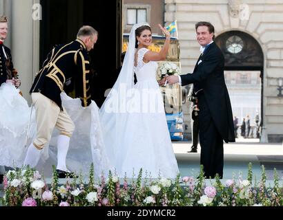 Princess Madeleine of Sweden and Christopher O'Neill smile at wellwishers following their marriage ceremony in the Royal Chapel inside the Royal Palace in Stockholm, Sweden on Saturday June 8, 2013. Photo by Patrick Bernard/ABACAPRESS.COM Stock Photo