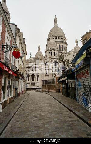 Paris, France - March 2020: Basilica of the Sacred Heart of Paris (Sacré-Cœur), in Montmartre, during the first COVID lockdown Stock Photo