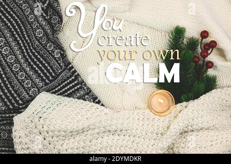 Winter cozy background and inspiration, woolen and knitted sweater, composition with text you create your own calm Stock Photo