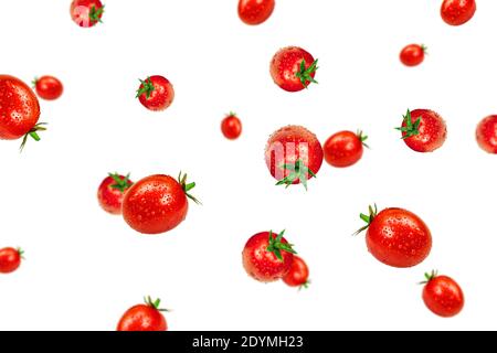 Fresh cherry tomatoes with water drops on a white background. Flying cherry tomatoes. High quality photo Stock Photo