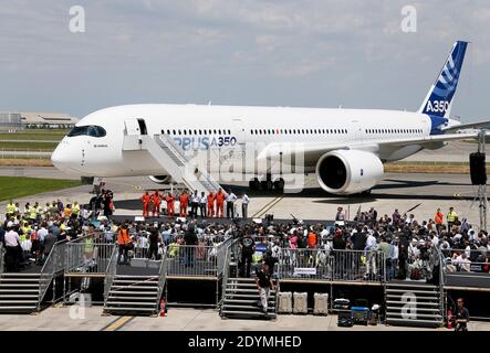 The new Airbus A350 XWB lands after its long-awaited inaugural flight at Toulouse-Blagnac airport, southwestern France on June 14, 2013. The A350 XWB is the first in a family of super-efficient passenger planes Airbus designed to go head-to-head with rival Boeing's 787 Dreamliner and 777s. The highly fuel-efficient plane, made with a majority of composite materials, likely means an appearance at the upcoming Paris Air Show which begins next Monday at Le Bourget airport. Photo by Patrick Bernard/ABACAPRESS.COM Stock Photo