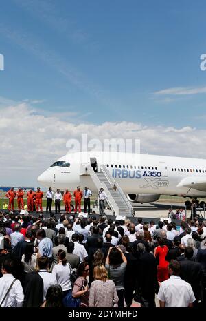 The new Airbus A350 XWB lands after its long-awaited inaugural flight at Toulouse-Blagnac airport, southwestern France on June 14, 2013. The A350 XWB is the first in a family of super-efficient passenger planes Airbus designed to go head-to-head with rival Boeing's 787 Dreamliner and 777s. The highly fuel-efficient plane, made with a majority of composite materials, likely means an appearance at the upcoming Paris Air Show which begins next Monday at Le Bourget airport. Photo by Patrick Bernard/ABACAPRESS.COM Stock Photo