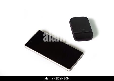 Smartphone and 4g wifi modem in a white background Stock Photo