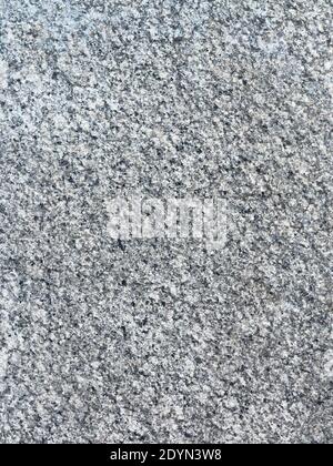 Grey stone wall textured background close-up Stock Photo