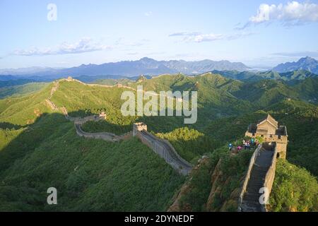 Chinese Great Wall in summer under the blue sky; famous tourist attraction Stock Photo
