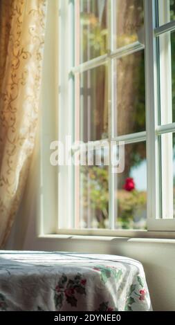 The sunlight shines into the bedroom through windows Stock Photo
