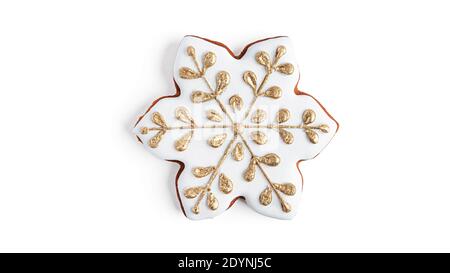 Gingerbread in the shape of a snowflake on a white background. High quality photo Stock Photo