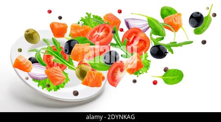 Flying salmon salad isolated on white background Stock Photo
