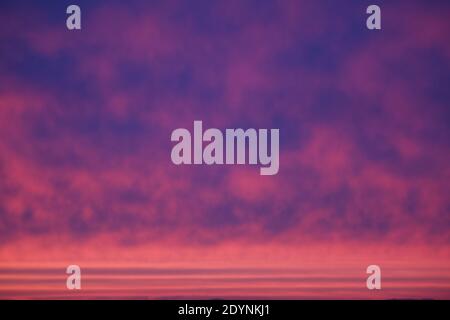 No fake cloud arrangement during sun set Stock Photo