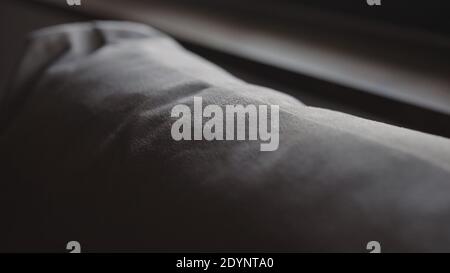 shot of couch pillow from faux suede fabric, wide photo Stock Photo