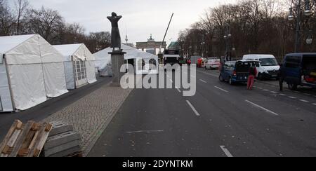 Berlin, Germany. 27th Dec, 2020. Tents are standing on the Straße des 17. There, the construction work for the digital New Year's Eve party 'Welcome Berlin 2021' has begun. Credit: Paul Zinken/dpa/Alamy Live News Stock Photo