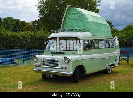 Classic Bedford Camper Van  parked in field with top up. Stock Photo