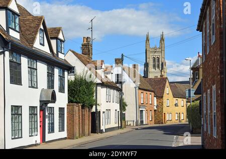 St Mary's  Street Eynesbury  with the tower of St Mary's church St Neots in background. Stock Photo