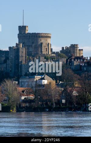 Windsor, Berkshire, UK. 27th December, 2020. High river levels in the River Thames flow past Windsor Castle. A flood alert is in place on the River Thames for Windsor, Eton and Maidenhead. Levels have risen on the River Thames as a result of heavy rainfall upstream. Therefore, flooding of roads, paths and farmland is expected to continue today. The Jubilee River is not currently in full operation due to maintenance works, but will be operated should levels continue to rise. Credit: Maureen McLean/Alamy Live News Stock Photo