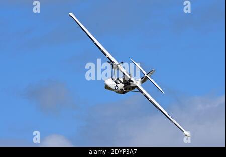 Vintage  PBY-5A Catalina Miss Pick Up (G-PBYA) Flying Boat  in Flight. Stock Photo