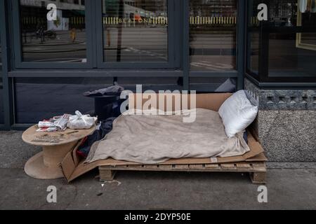 A rough sleeper’s bedding and personal belongings seen during the day near the West End. London, UK. Stock Photo