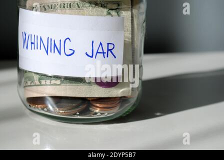 A close-up of a homemade 'whining jar' Every time you complain, you put a certain amount of money into it Stock Photo - Alamy