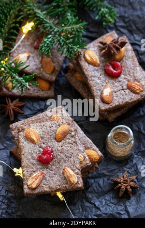 Chocolate chip cookies with almonds and cherries in the form of playing cards. Stock Photo