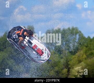 World Champion Lee Stone competing in freestyle Jet Ski competition at Ride Leisure Wyboston Lakes Bedfordshire. Stock Photo