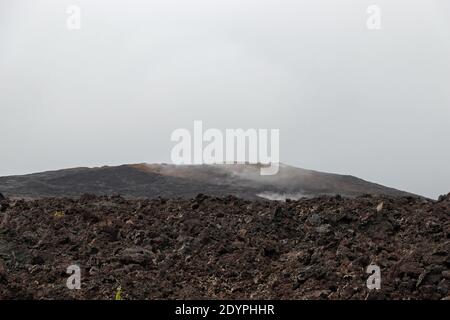 Volcano National Park on Hawaii Black Rock Steam Stock Photo