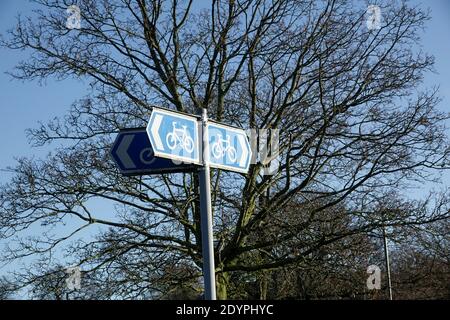 Blue cycle path signs part of London’s cycling infrastructure and wider cycling network. Stock Photo