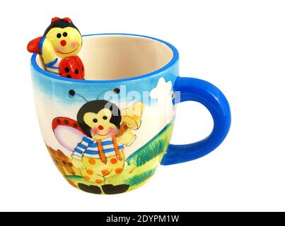 Decorated cup isolated on white background Stock Photo