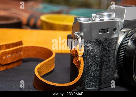 An old retro vintage camera with a brown leather strap Stock Photo