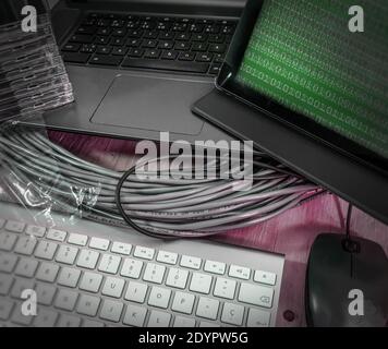 Computer keyboards, cabling, binary codes etc.. Stock Photo