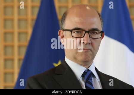 French Minister of Finance Pierre Moscovici attends a press conference on the 'Livret A' bank savings account, at the Finance Ministry headquarters in Paris, France on July 18, 2013. The interest rate of the Livret A will fall from 2.25% to 1.75% under an agreement between the government and the Banque de France. The new rate will apply from February 1. Photo by Stephane Lemouton/ABACAPRESS.COM Stock Photo