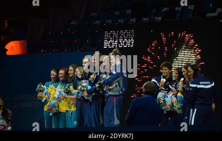 (Top L-R) Gold medalists US swimmers Katie Ledecky, Shannon Vreeland, Karlee Bispo and Missy Franklin, (bottom L-R) Silver medalists Australia's Alicia Coutts, Brittany Elmslie, Kylie Palmer and Bronte Barratt and (bottom R-L) bronze medalists France's Camille Muffat, Mylene Lazare, Charlotte Bonnet and Coralie Balmy pose on the podium during the award ceremony of the women's 4x200-metre freestyle relay during the 15th FINA Swimming World Championships at Montjuic Municipal Pool in Barcelona, Spain on August 1, 2013. Photo by Christian Liewig/ABACAPRESS.COM Stock Photo