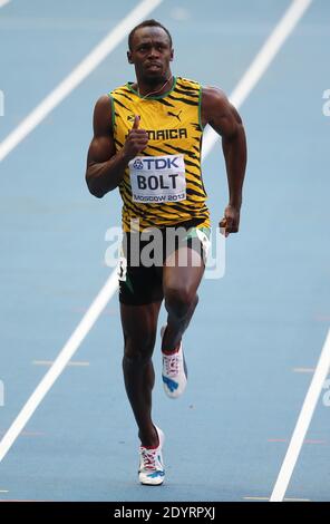 Usain Bolt of Jamaica (C) wins the 100m final ahead of Justin Gatlin (R) of the US at the 14th IAAF World Championships in Athletics at Luzhniki Stadium in Moscow, Russia, on August 11, 2013. At Left Jamaica's Kemar Bailey-Cole. Photo by Giuliano Bevilacqua/ABACAPRESS.COM Stock Photo