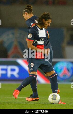 PSG's Edinson Cavani and Zlatan Ibrahimovic during the French First League soccer match, PSG vs Ajaccio in Paris, France, on August 18th, 2013. PSG and Ajaccio drew 1-1 Photo by Henri Szwarc/ABACAPRESS.COM Stock Photo