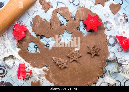 Top view of the kitchen table with Christmas gingerbread in preparation Stock Photo