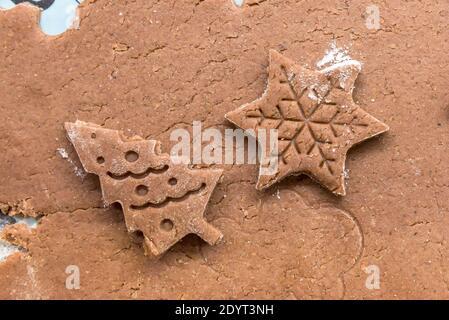 Closeup of the kitchen table with Christmas gingerbread in preparation Stock Photo