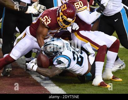 Landover, United States. 27th Dec, 2020. Carolina Panthers running back Mike Davis (28) pushes for a 1-yard touchdown against the Washington Football Team in the second quarter at FedEx Field in Landover, Maryland on Sunday, December 27, 2020. Photo by Kevin Dietsch/UPI Credit: UPI/Alamy Live News Stock Photo