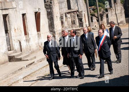 German President Joachim Gauck, French President Francois Hollande and survivor of the massacre in Oradour-sur-Glane during World War II Robert Hebras are pictured at the memorial site in Oradour-sur-Glane, France on September 4, 2013. A unit of SS officers murdered 642 citizens of the town in June 1944. The German President is on a three-day visit to France. Photo by Florent Dupuy/Pool/ABACAPRESS.COM Stock Photo