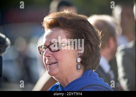 Former leader of the French Christian Democratic (PCD) party and former right-wing party UMP minister Christine Boutin and other French people stand alongside Syrians who support the regime of Syrian President Bashar al-Assad as they take part in a demonstration against US and French intervention in the conflict, at the Trocadero in Paris, France on September 3, 2013. Meanwhile the UN High Commissioner for Refugees said today that more than two million Syrians have fled Syria and some 4.2 million have been displaced internally by the 29-month long conflict which has already claimed 110 000 liv Stock Photo