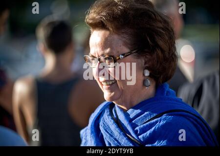 Former leader of the French Christian Democratic (PCD) party and former right-wing party UMP minister Christine Boutin and other French people stand alongside Syrians who support the regime of Syrian President Bashar al-Assad as they take part in a demonstration against US and French intervention in the conflict, at the Trocadero in Paris, France on September 3, 2013. Meanwhile the UN High Commissioner for Refugees said today that more than two million Syrians have fled Syria and some 4.2 million have been displaced internally by the 29-month long conflict which has already claimed 110 000 liv Stock Photo