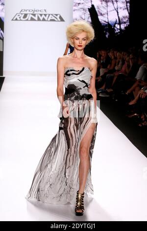 Models display creations by Alexander Pope at the Project Runway Season 12  Finale during MBFW Spring/