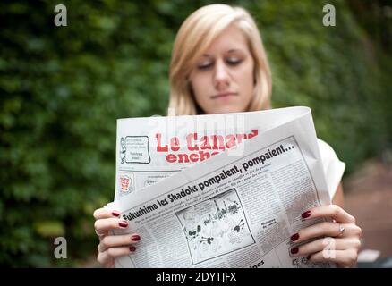 French satirical paper 'Le Canard Enchaine' published a cartoon about the Fukushima Nuclear Accident in Paris, France on September 11, 2013. Photo by Thierry Orban/ABACAPRESS.COM Stock Photo